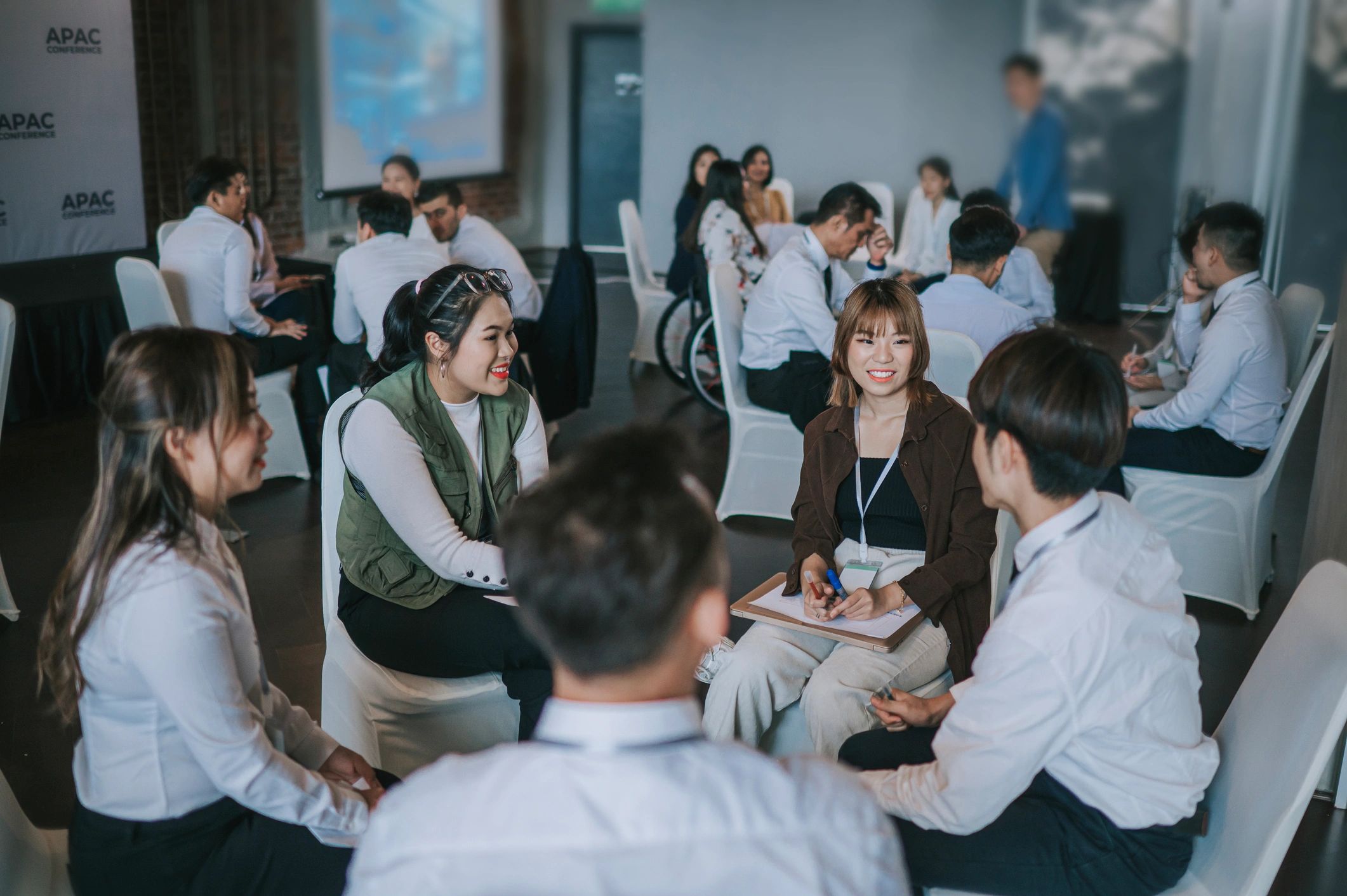 Workshop participants brainstorming in a small group